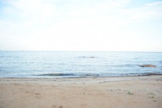 沙滩涨潮摄影图片